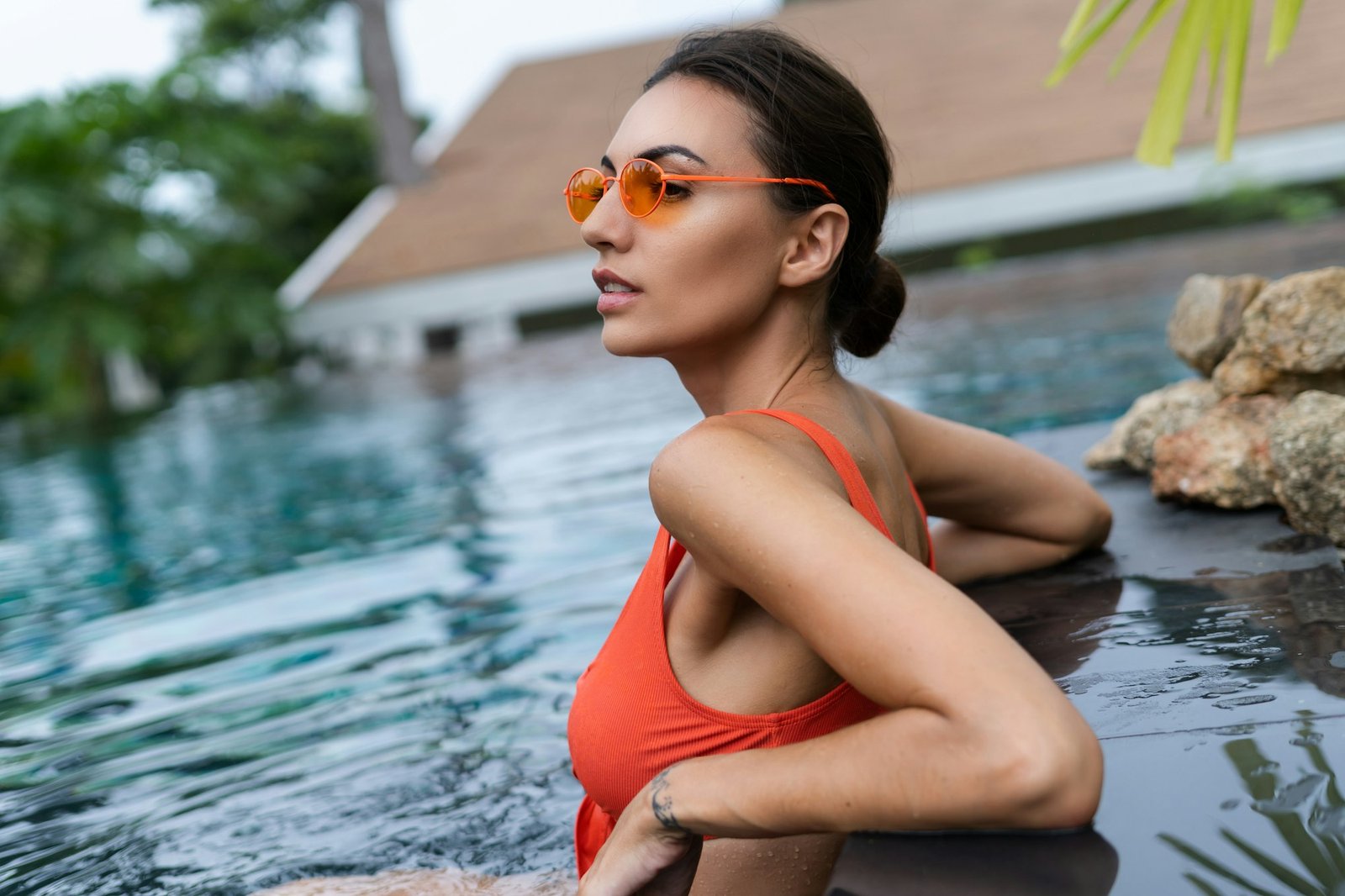 Beautiful european women in two pieces orange bikini swimsuit